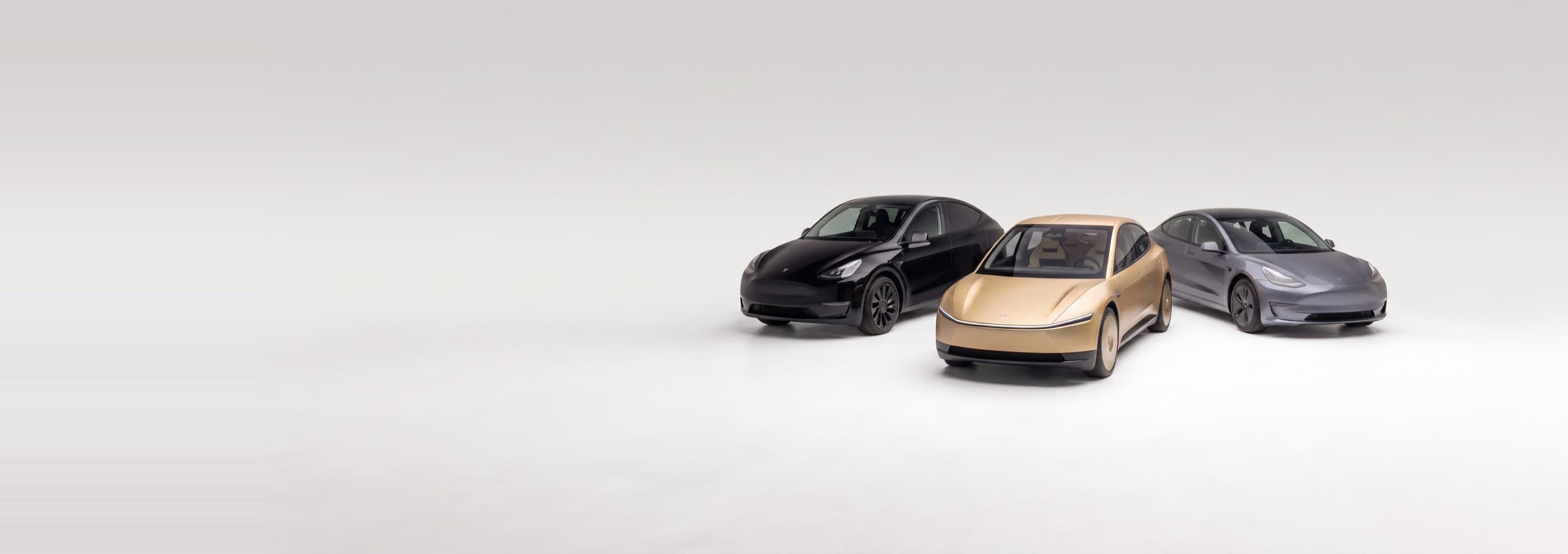 A Tesla Model Y, Cybercab and Model 3 together in a studio
